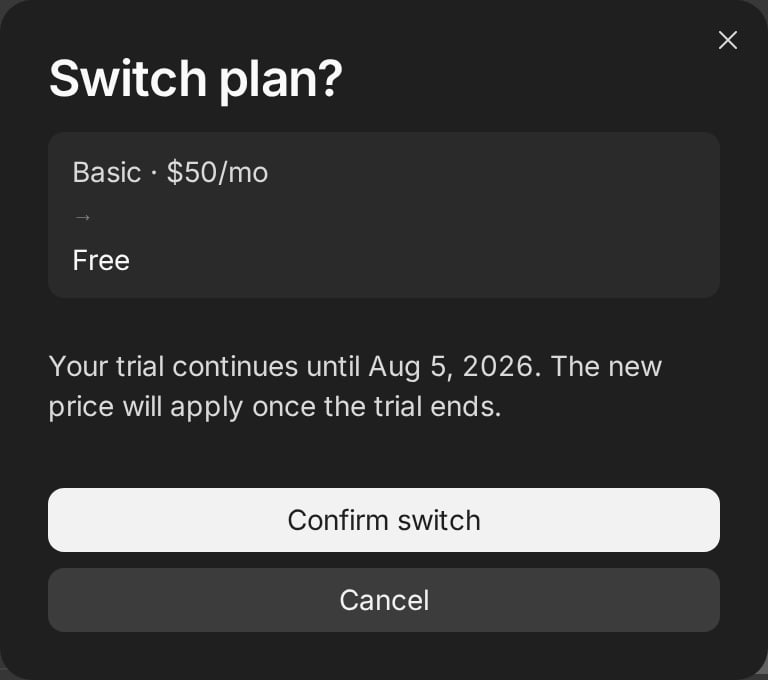 A Switch plan? dialog showing Basic at $50 per month changing to Free, a note that the trial continues until August 5 2026, and Confirm switch and Cancel buttons