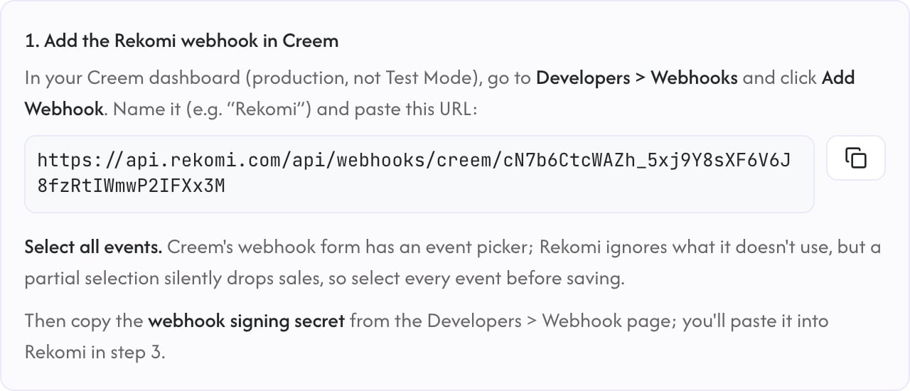 Rekomi showing the per-workspace Creem webhook URL to copy, with a reminder to select all events