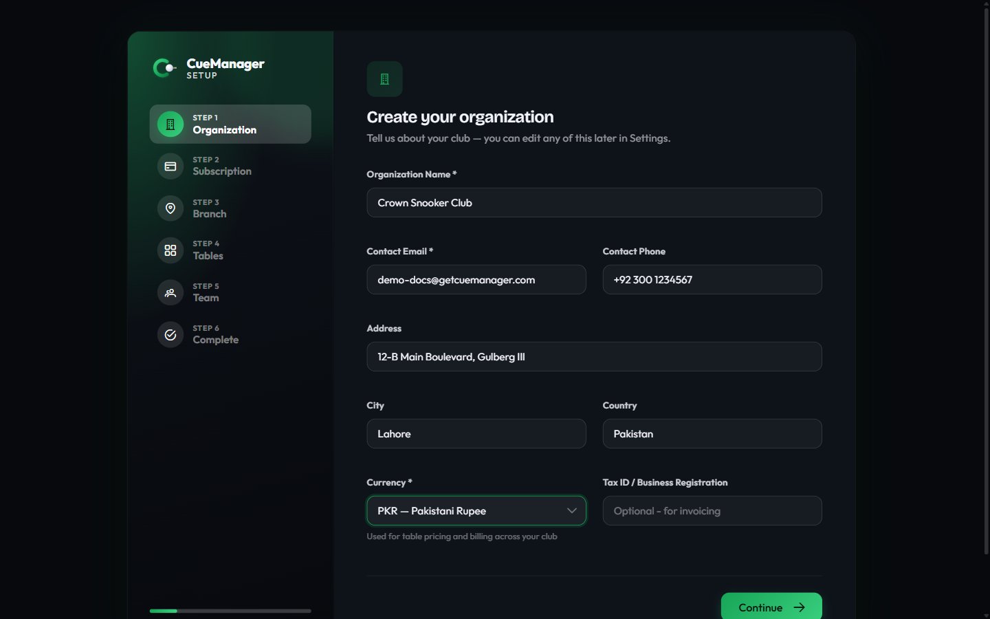 Onboarding step 1 with organization name, contact details, and currency selection