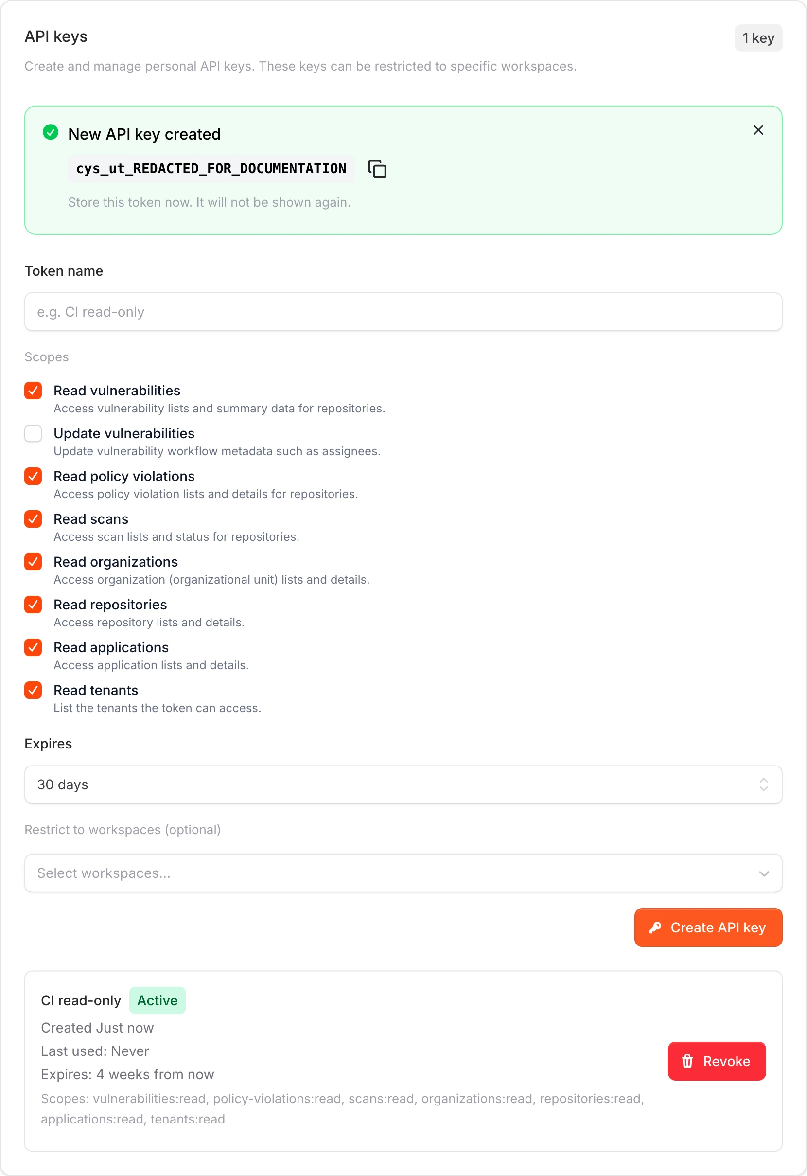 New API key created dialog showing the key value with a copy button and warning to store it securely.