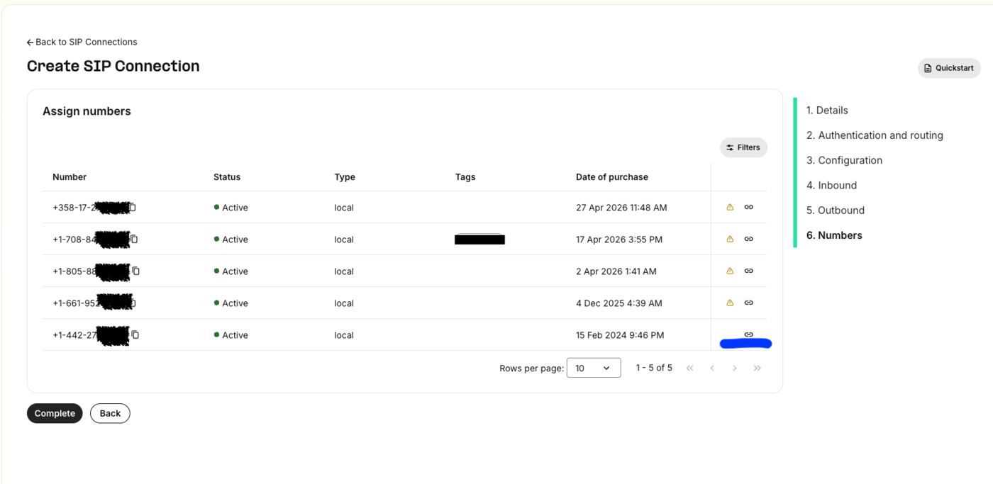 The Telnyx Assign numbers step listing account numbers ready to link to the connection