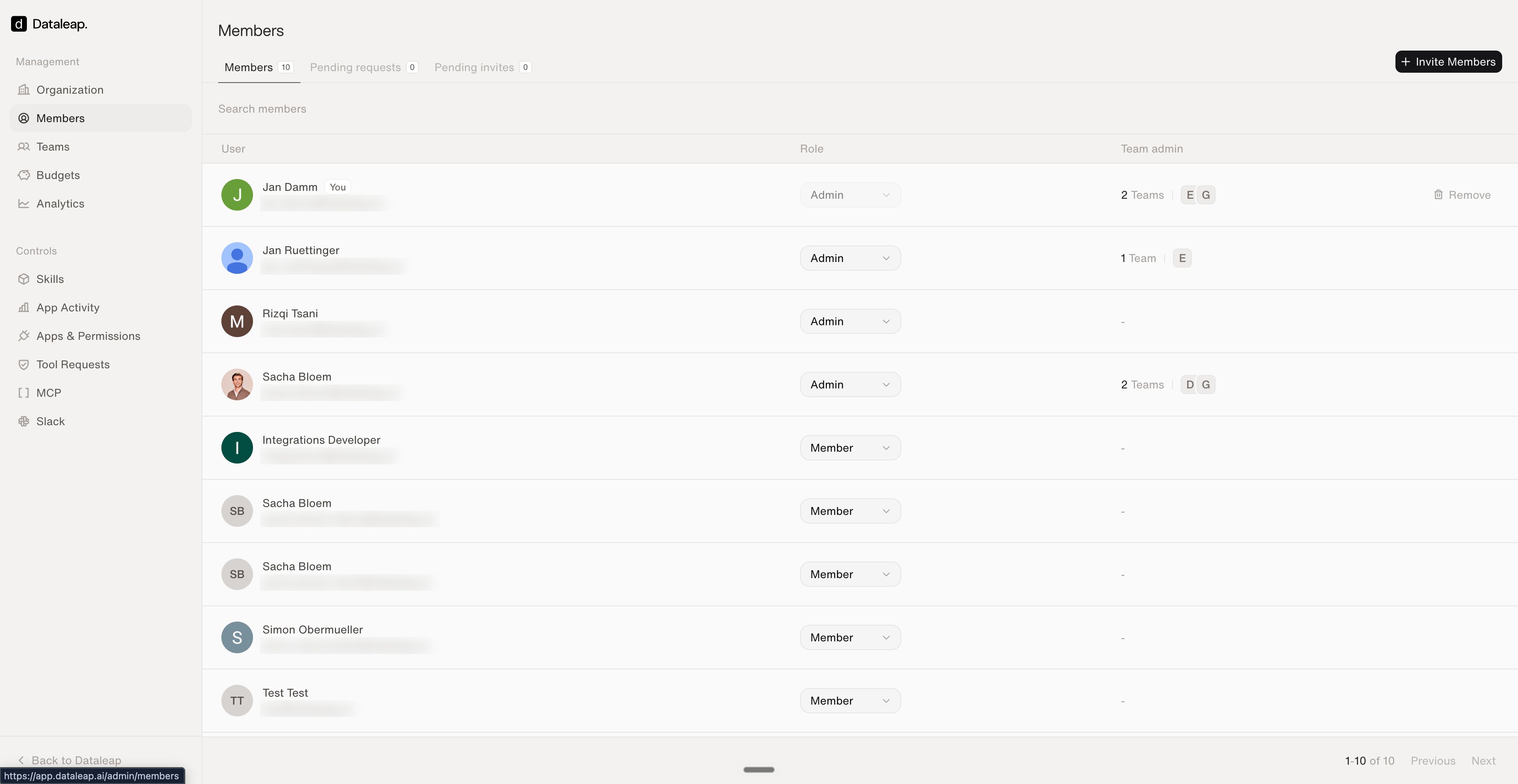 The Members page of the admin panel showing users with Admin or Member roles, team admin badges, and an Invite Members button