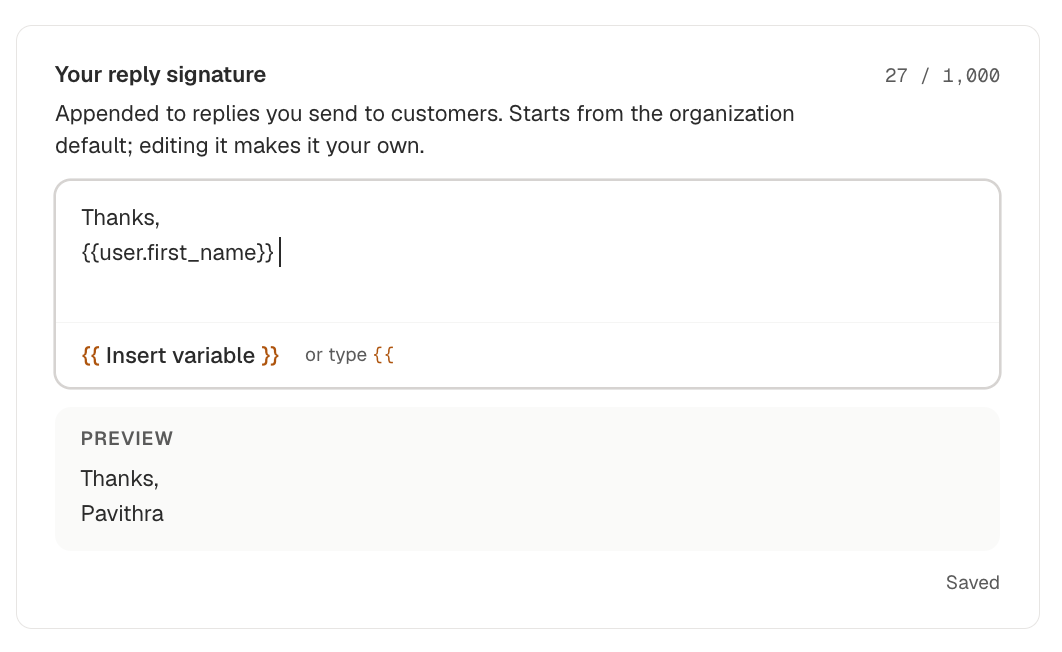 The reply signature editor, with a variable in the box and the rendered name in the preview below