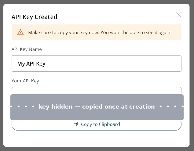 The API Key Created dialog with a Copy to Clipboard button