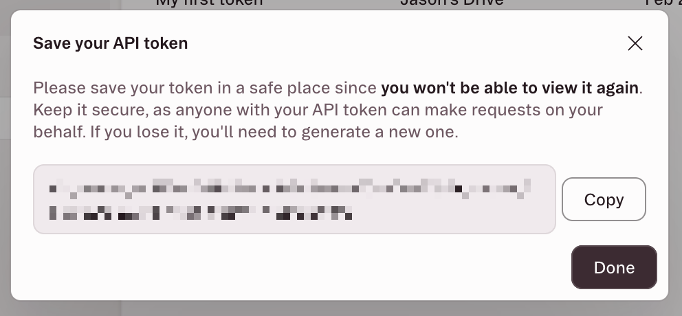 API token generated modal showing the token value