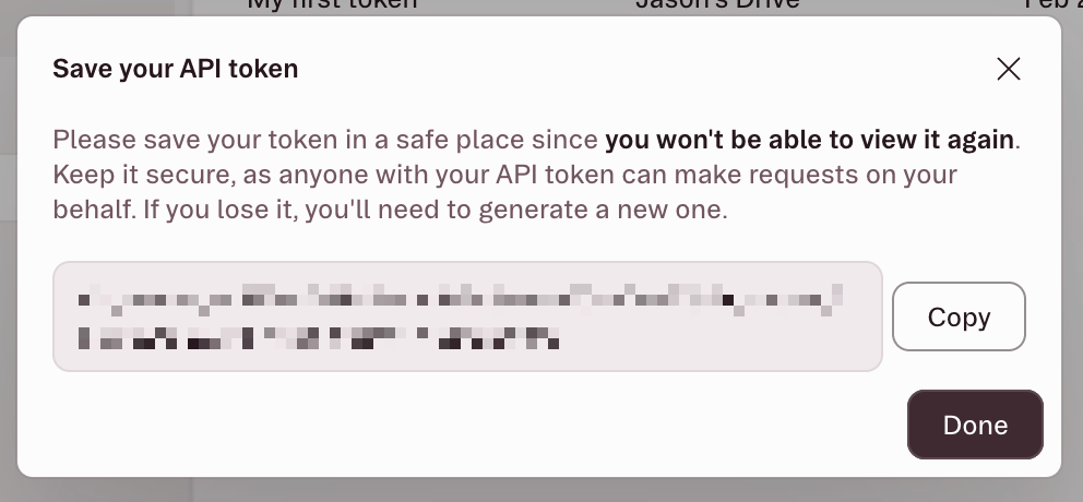 API token generated modal showing the token value