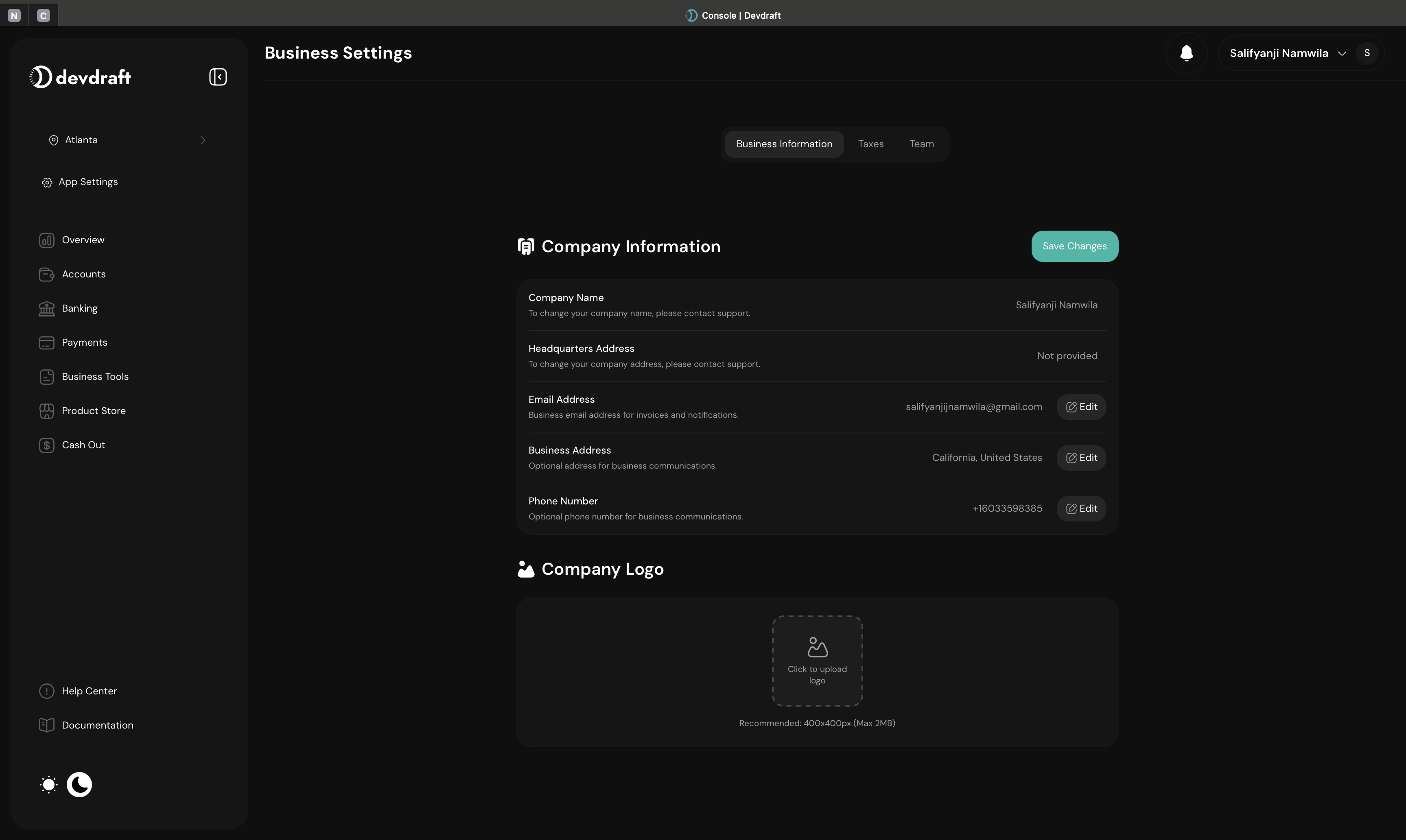 Business details configuration interface with company information - dark mode