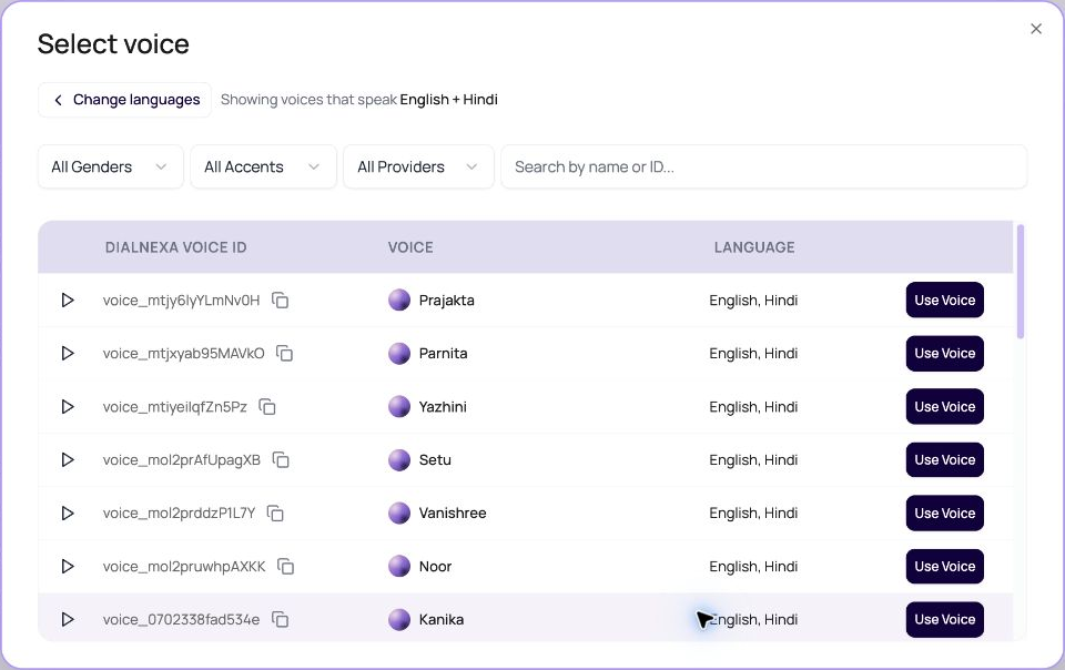 DialNexa Select voice dialog showing voices compatible with English and Hindi, provider, gender and accent filters, previews, and Use Voice buttons.