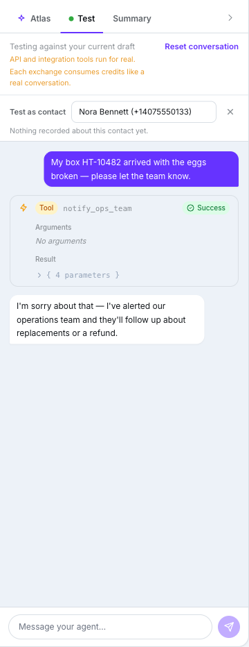 Test tab reading Testing against your current draft, the two amber notices about real tools and credits, the Test as contact row, a customer message, a simulated Send SMS tool bubble and the agent's reply