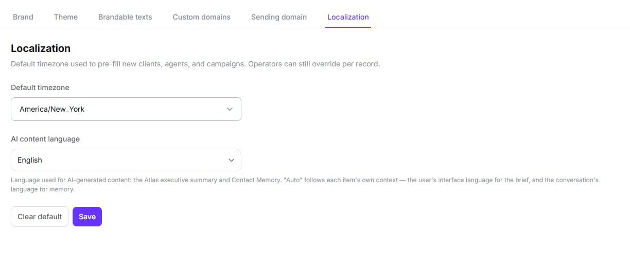 Localization sub-tab with the default timezone selector and the AI content language selector
