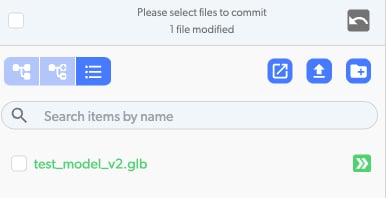 Renamed file shown in green with double arrow icon