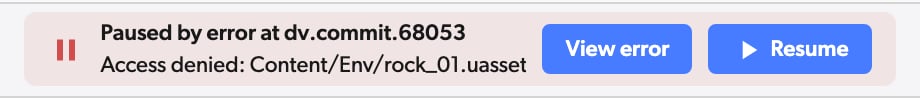 Workspace header reading Paused by error at dv.commit.68053 in red, with the error on the second line and View error and Resume buttons