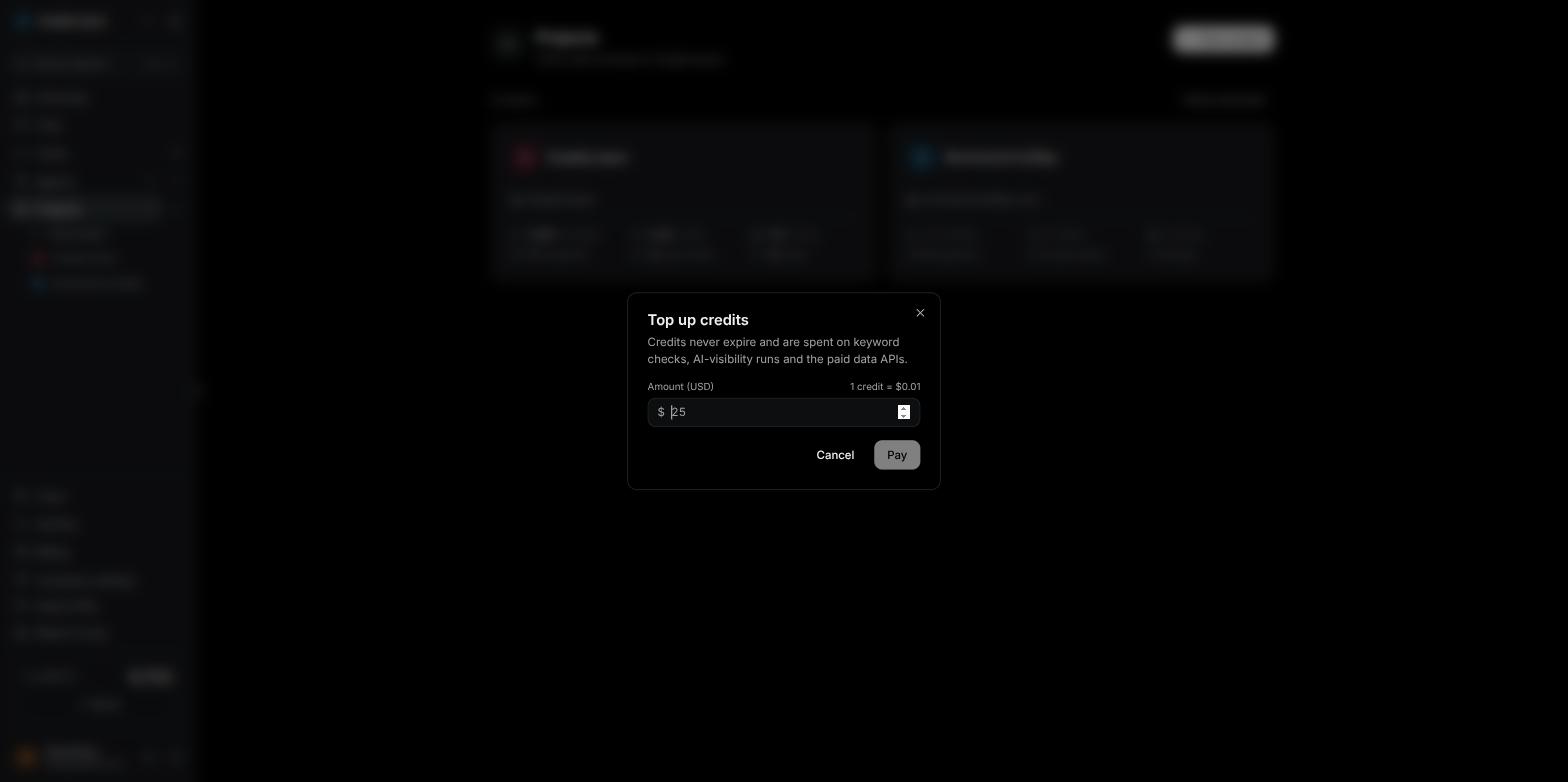 The Top up credits dialog with an amount typed and the equivalent credits shown
