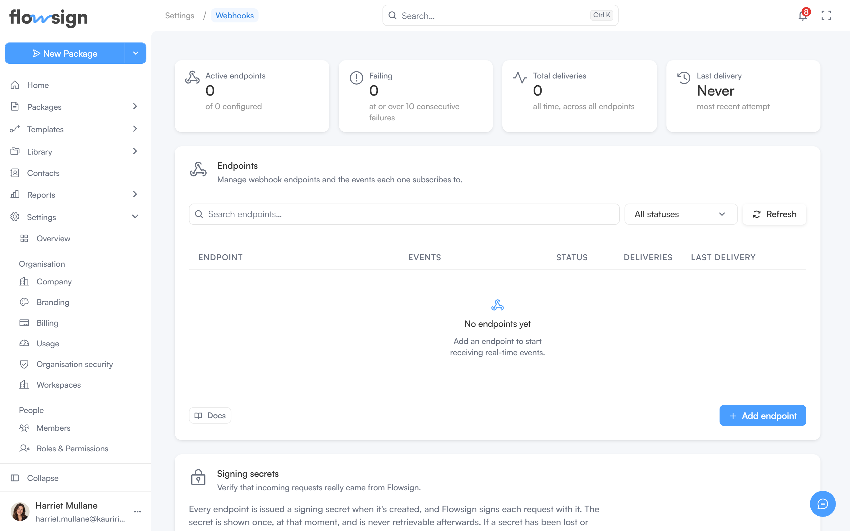 Webhooks settings page showing the four stat cards and the endpoints table