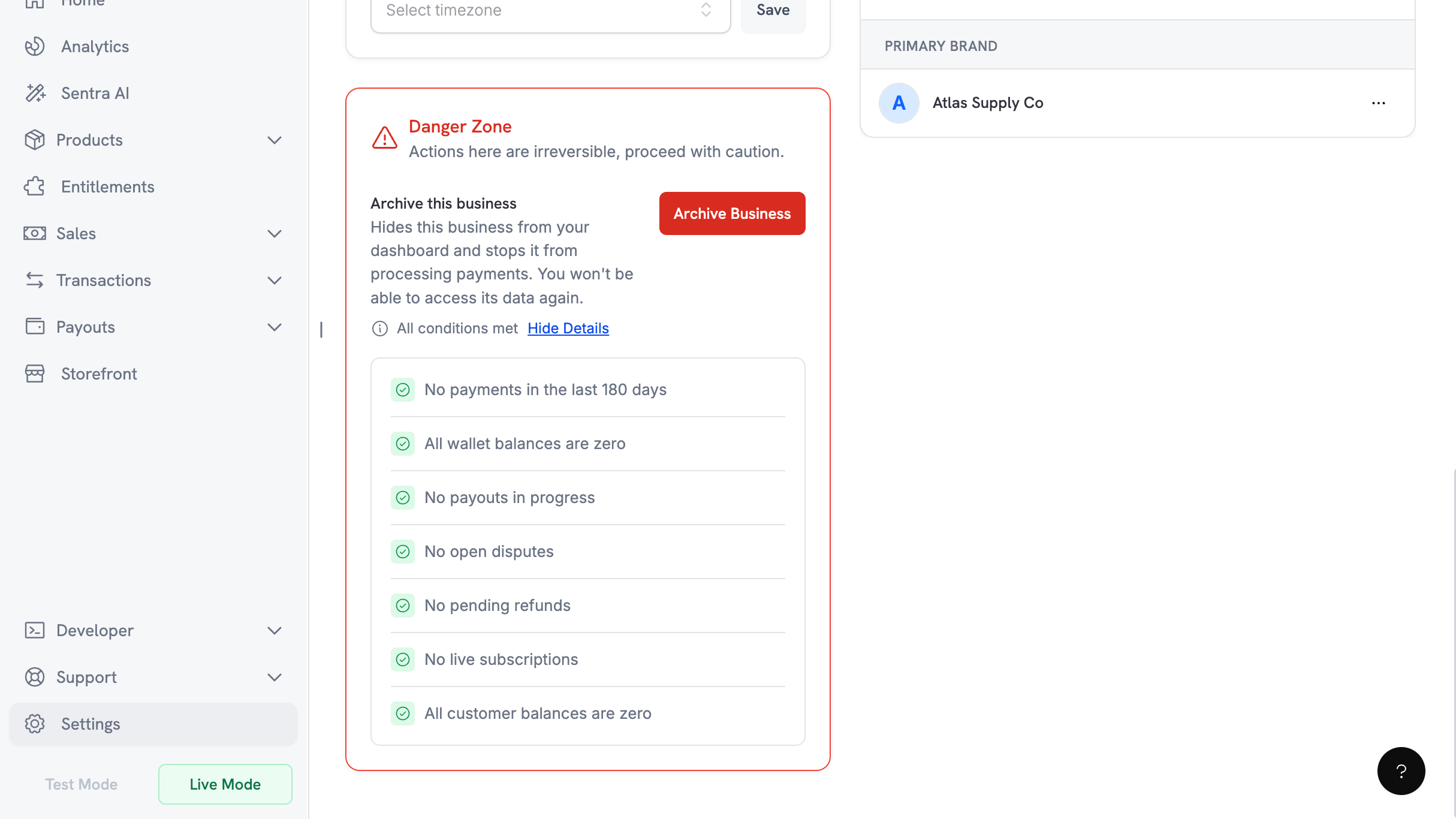 Danger Zone panel showing the Archive Business button and the seven-item eligibility checklist, all met