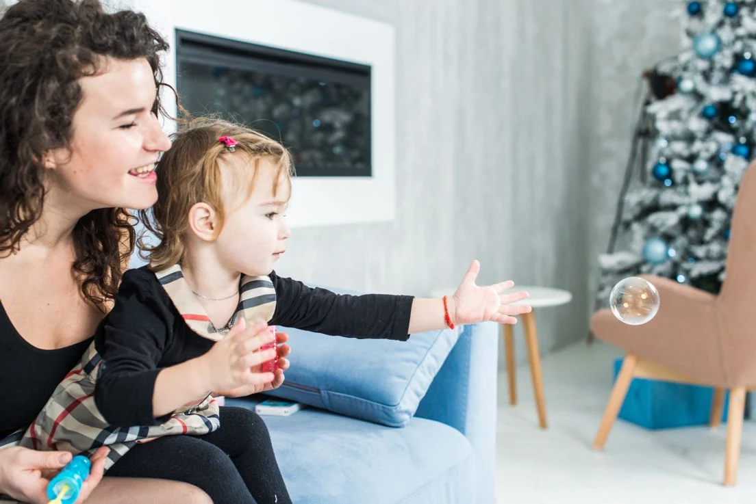 Beautiful Woman Her Cute Little Daughter Are Blowing Soap Bubbles