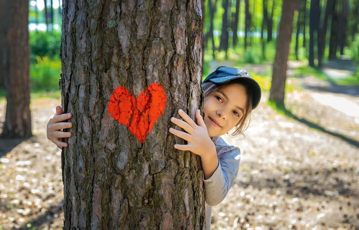 Child Hugs Tree