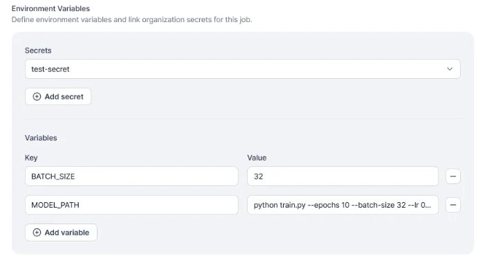 Environment Variables section of the job-create form with a Secrets dropdown, an Add secret button, and a Variables table for plain key-value pairs