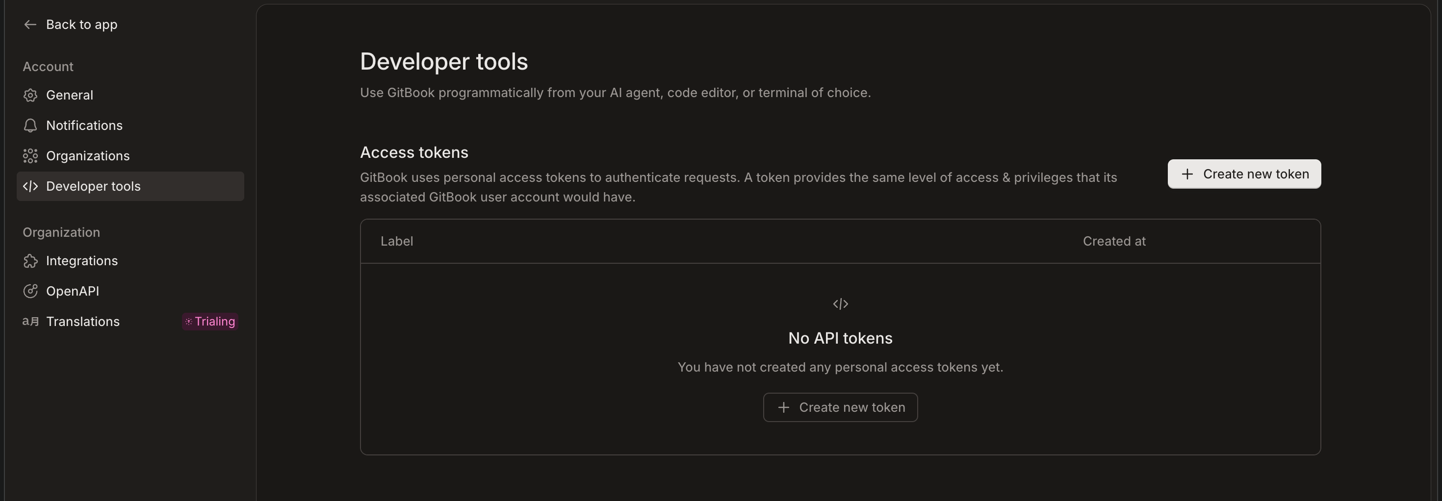 GitBook account settings on the Developer tools page showing the Access tokens section with no tokens created and a Create new token button