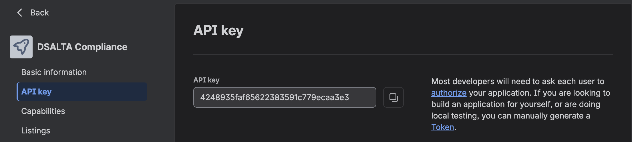 Trello Power-Up settings on the API key tab showing the generated API key field, a copy button, and a link to manually generate a Token