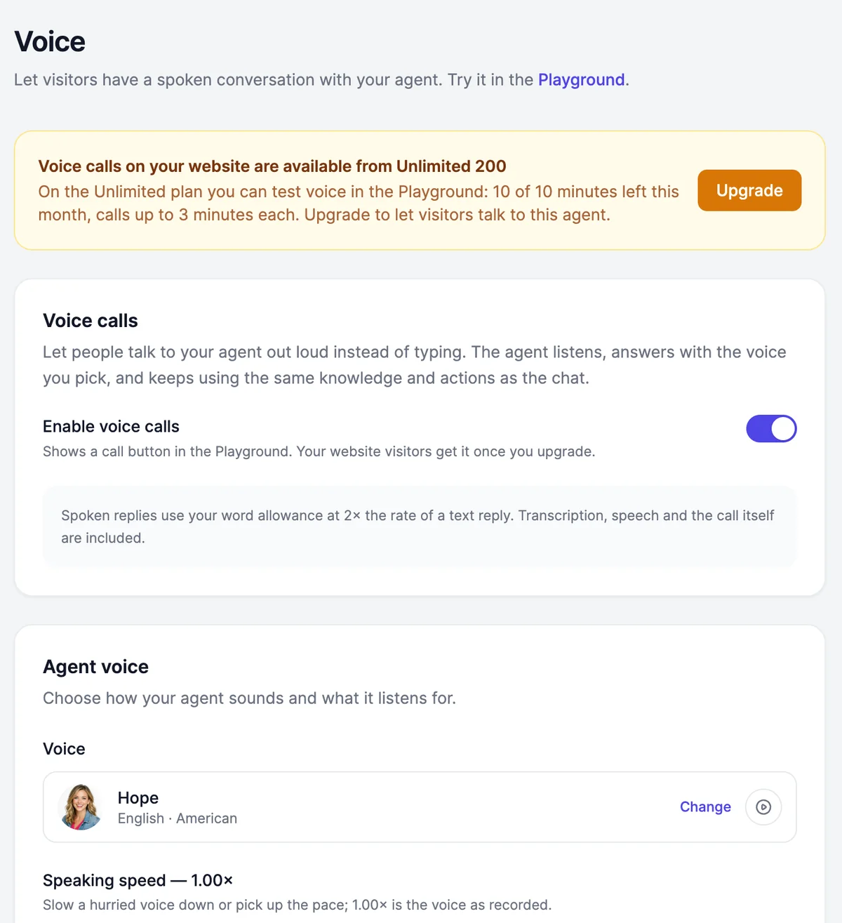 The Voice page: a banner saying voice calls on your website are available from Unlimited 200, the Enable voice calls switch on, a note that spoken replies use words at 2x the text rate, and Agent voice set to Hope, English, American, with a speaking speed of 1.00x