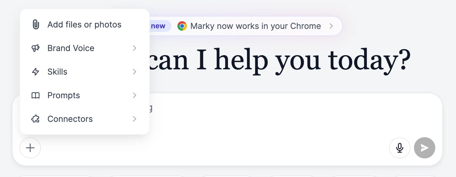 The + menu open above the message box, with Add files or photos, Brand Voice, Skills, Prompts, and Connectors