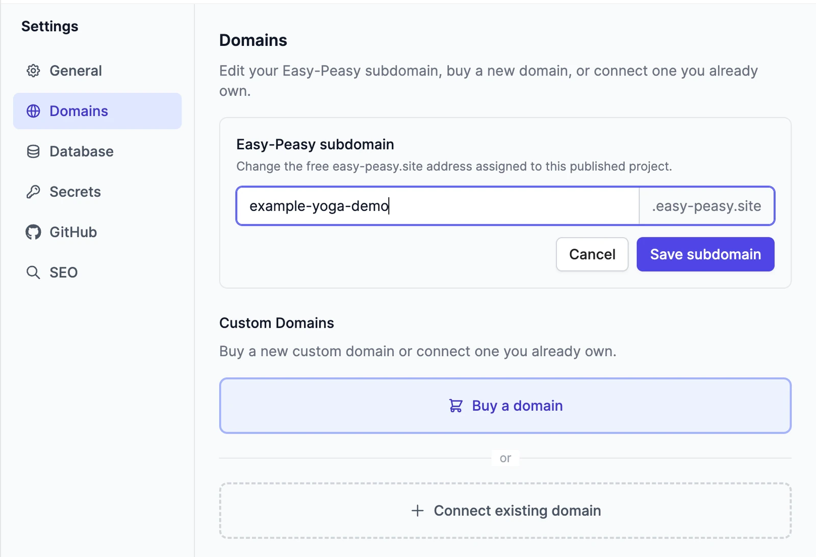 The Domains settings with the Easy-Peasy subdomain being edited to example-yoga-demo, Cancel and Save subdomain buttons, and below them the Custom Domains options Buy a domain and Connect existing domain