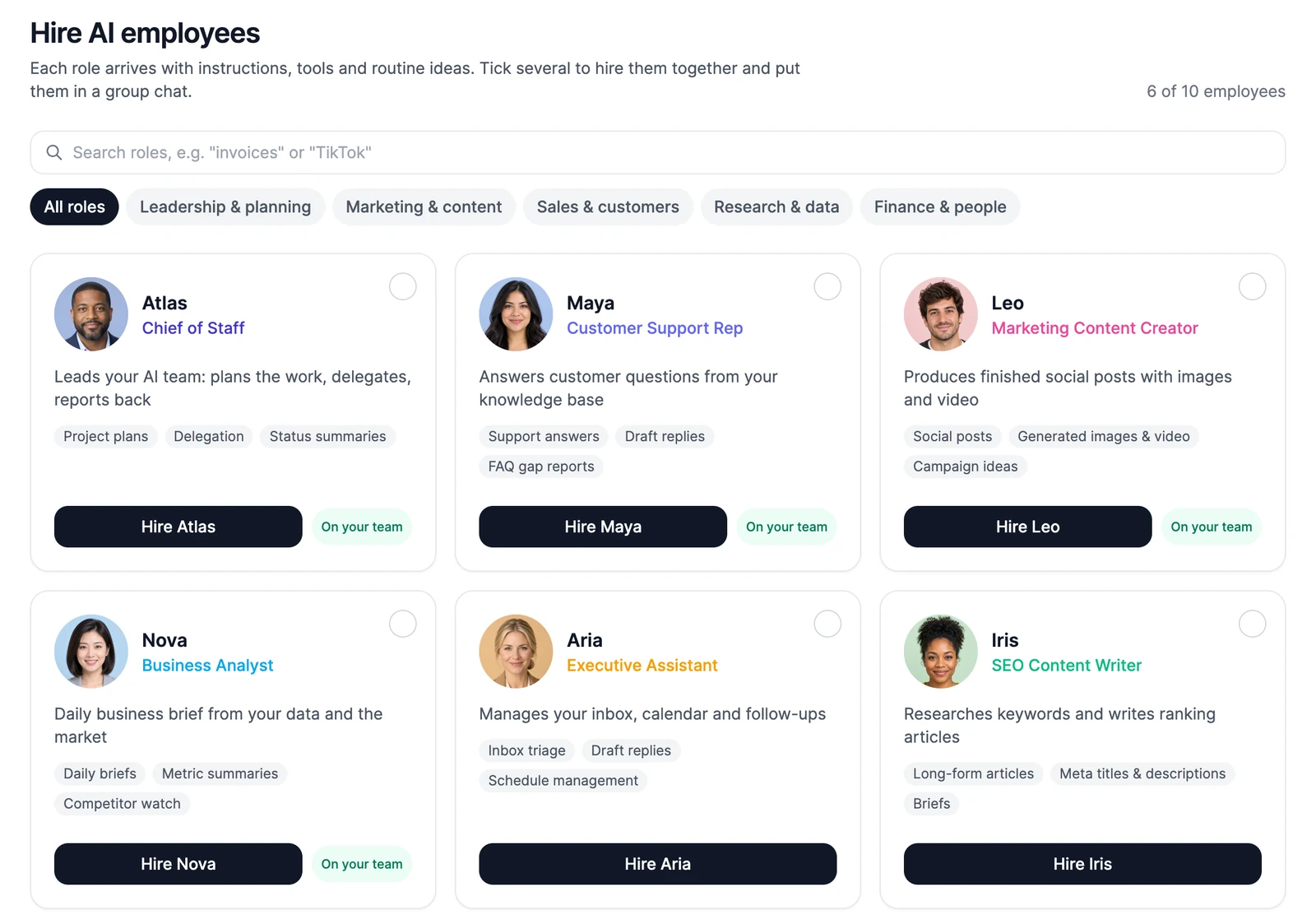 Hire AI employees: a search box, the role filters, and cards for Atlas, Maya, Leo, Nova, Aria and Iris, four of them marked On your team