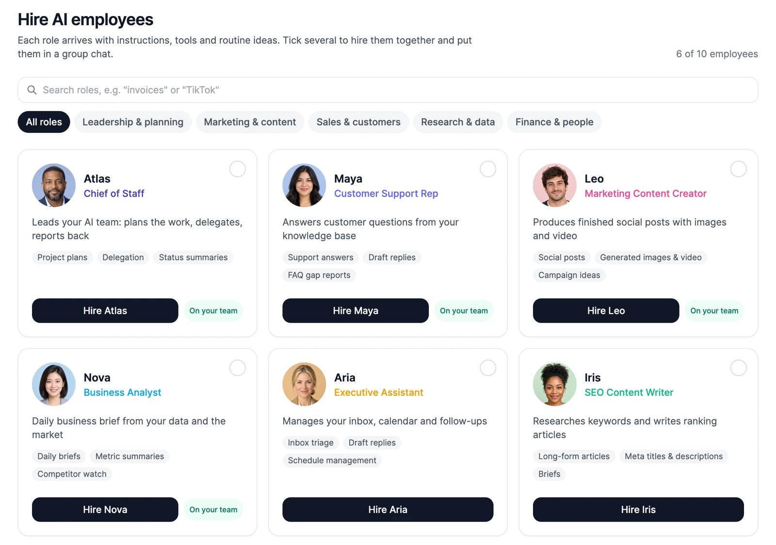 Hire AI employees: a search box, the role filters, and cards for Atlas, Maya, Leo, Nova, Aria and Iris, four of them marked On your team