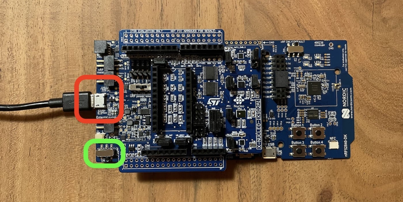 Micro-USB cable connected to the short-side USB port on the nRF52840 DK