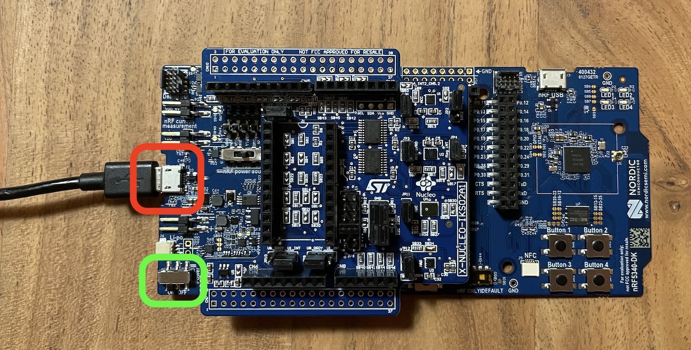 Micro-USB cable connected to the short-side USB port on the nRF5340 DK