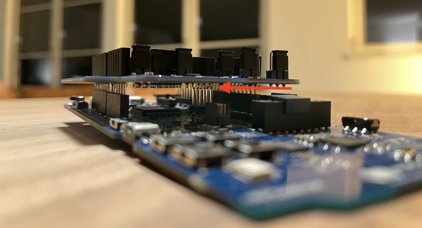 X-NUCLEO-IKS02A1 shield positioned above the center pins on the Nordic board