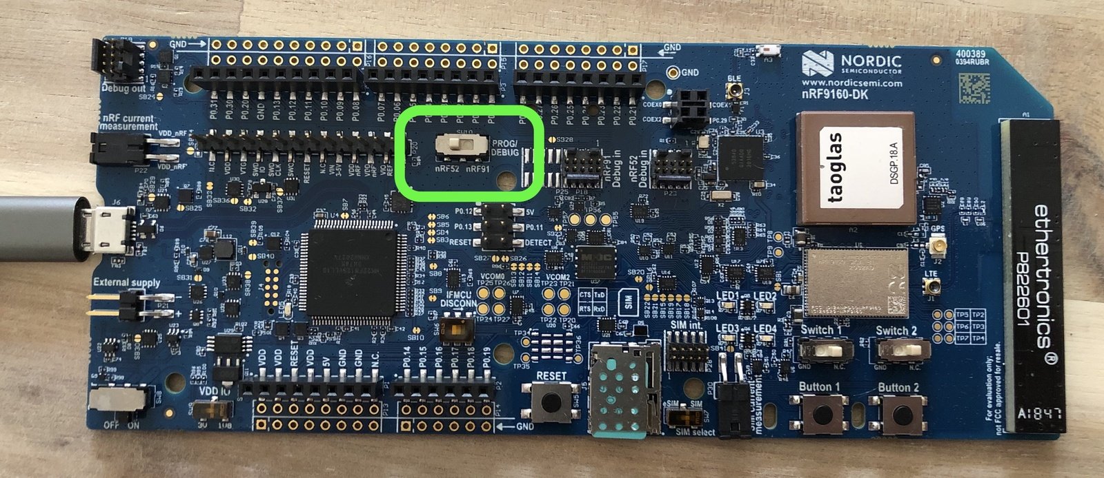 PROG/DEBUG switch set to nRF52 for flashing the board controller