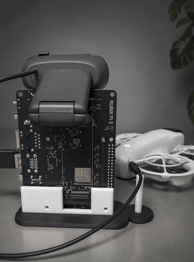 Rubik Pi 3 hardware setup with microphone webcam and power