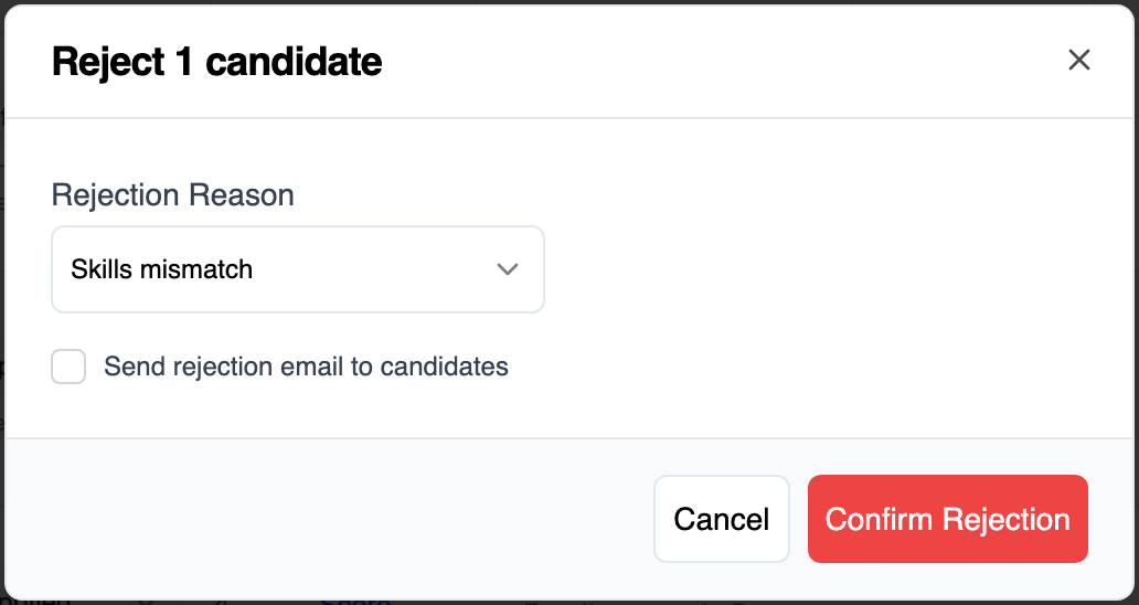 Reject 1 candidate dialog with Skills mismatch chosen as the rejection reason, an unticked Send rejection email to candidates checkbox, and Cancel and Confirm Rejection buttons