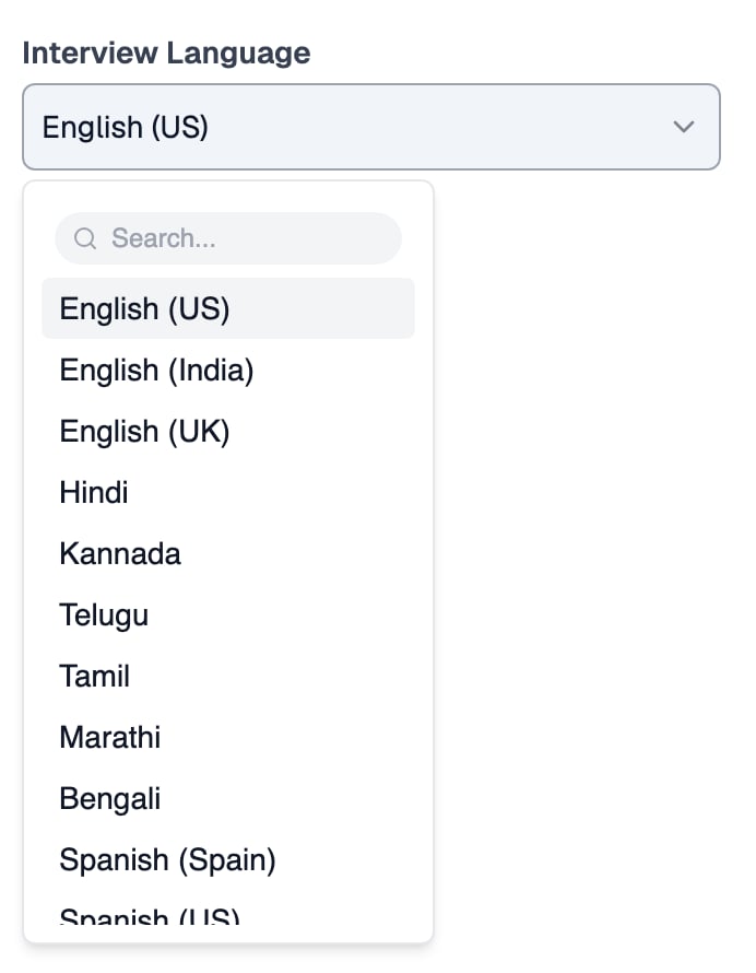 Interview Language dropdown open on a conversational interview's settings page, set to English (US), listing English (US), English (India), English (UK), Hindi, Kannada, Telugu, Tamil, Marathi, Bengali and Spanish (Spain), with more below