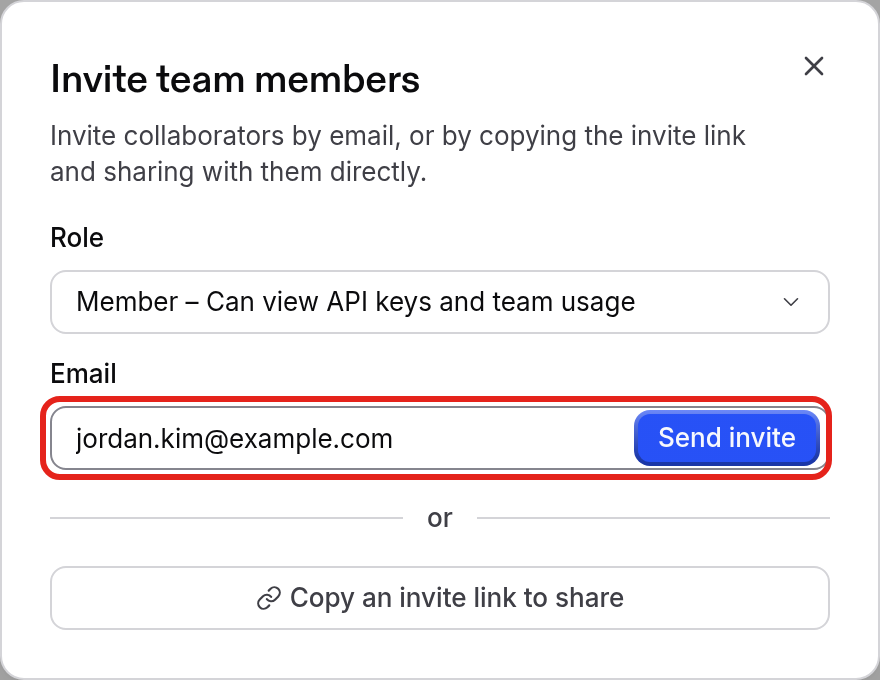 Invite team members dialog with a role, an email address, and the Send invite button