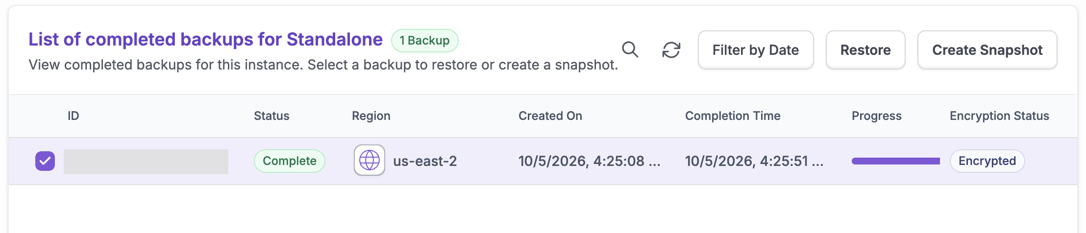 The Backups tab with a completed, encrypted backup and the Filter by Date, Restore, and Create Snapshot buttons