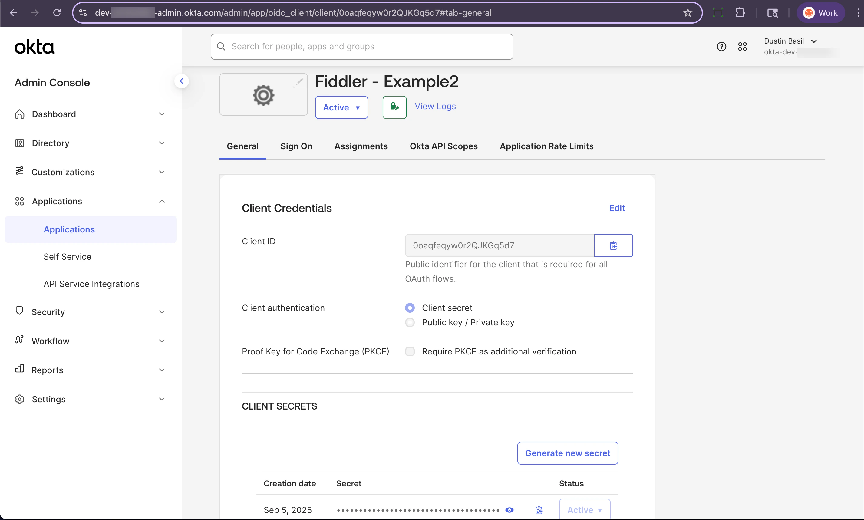 Okta admin console application page with client id and secret