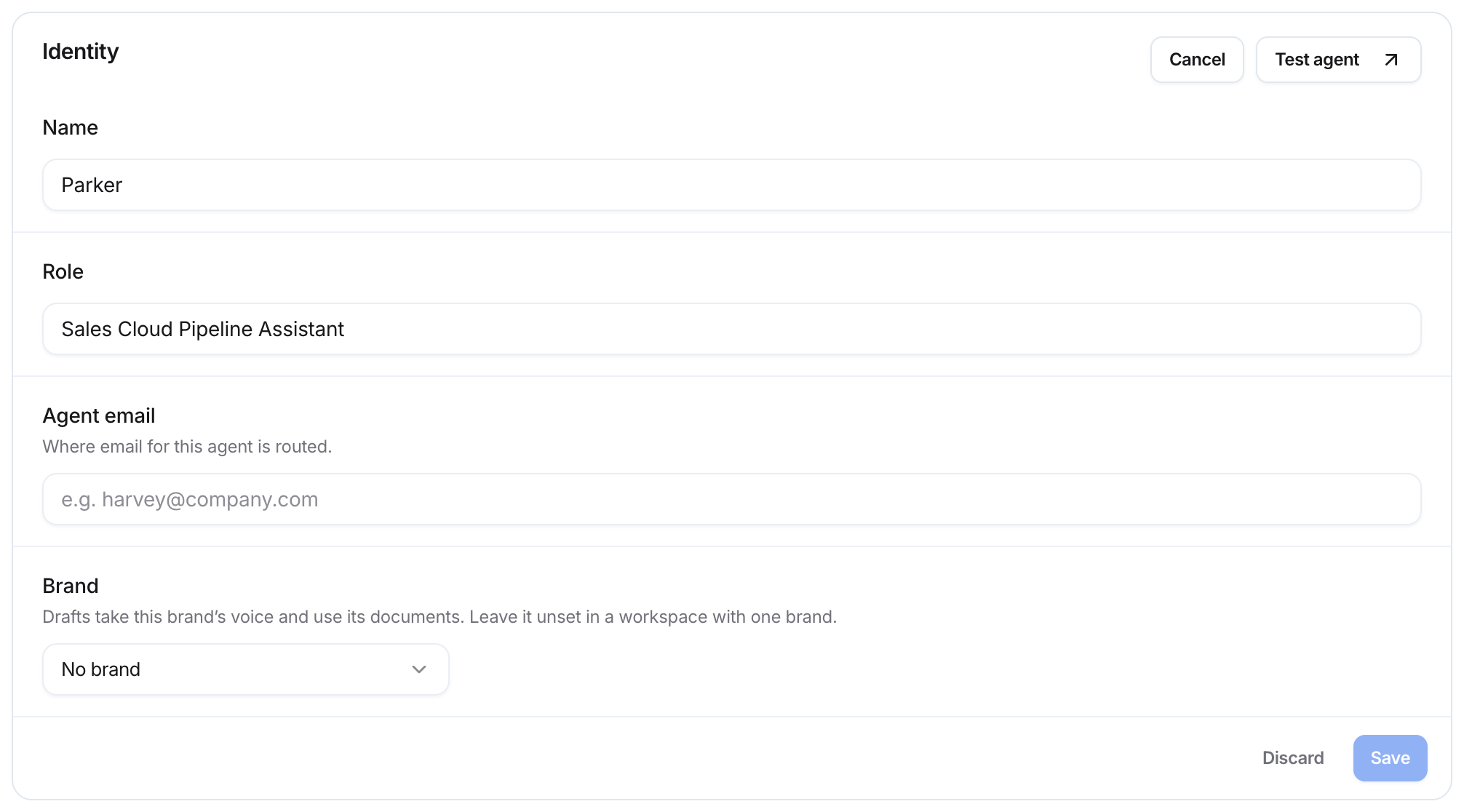 Identity group in edit mode with Name, Role, Agent email, and Brand fields, plus Discard and Save.