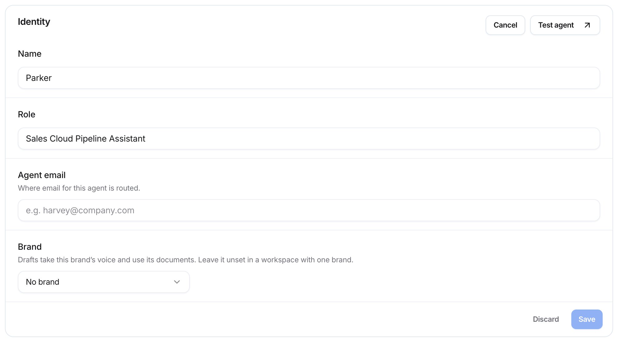 Identity group in edit mode with Name, Role, Agent email, and Brand fields, plus Discard and Save.