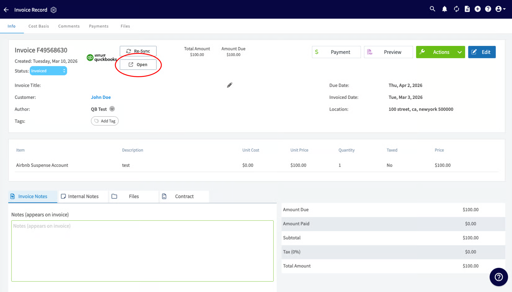 FieldPulse invoice record with the QuickBooks logo and the Open button highlighted