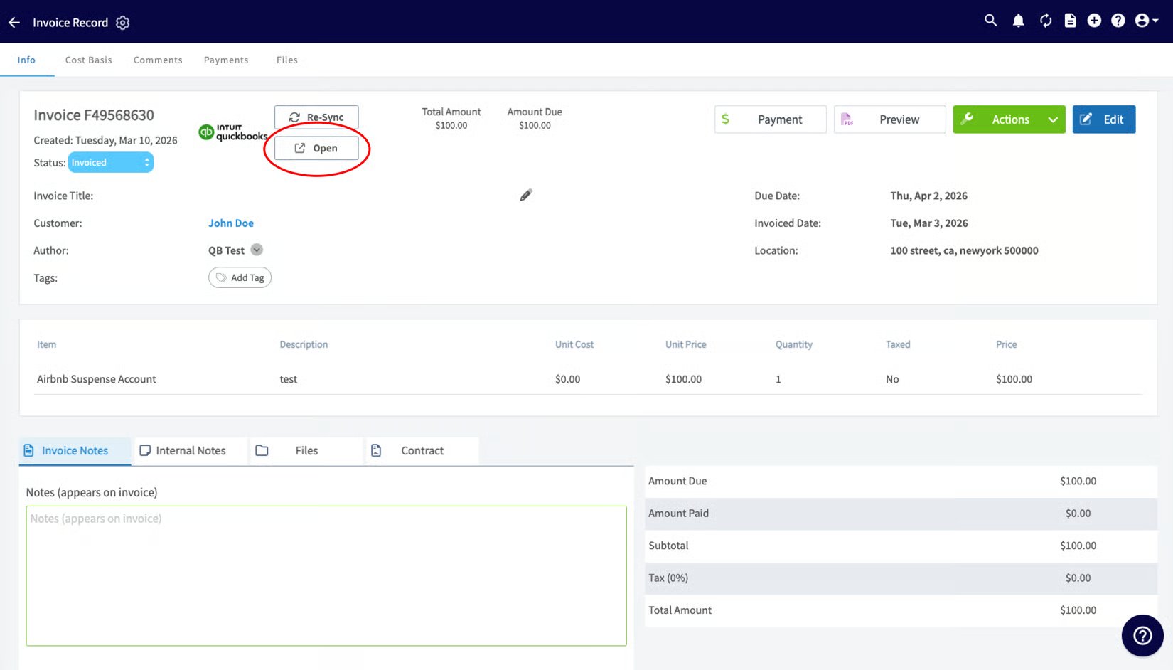 FieldPulse invoice record with the QuickBooks logo and the Open button highlighted