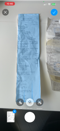 Camera view with a white outline around the receipt