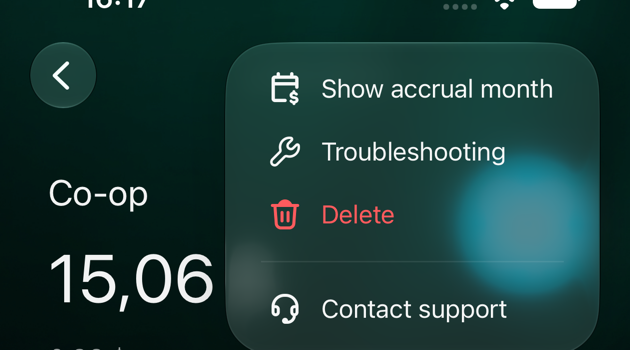 iOS Co-op transaction with the ⋮ menu open: Show accrual month, Troubleshooting, Delete, Contact support.