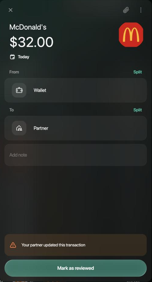 McDonald's transaction of $32.00 on the web: From Wallet, To Partner, with the warning Your partner updated this transaction and the Mark as reviewed button.