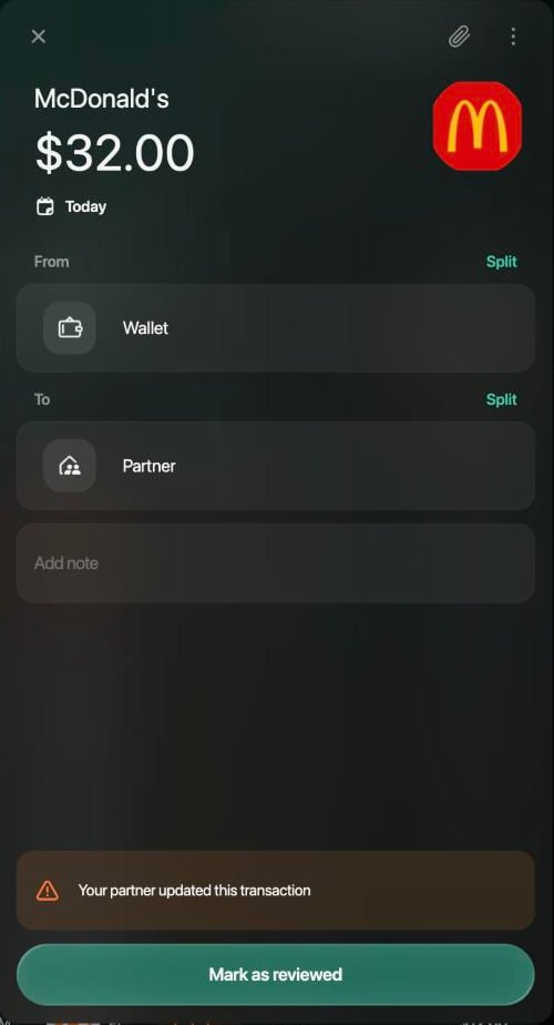 McDonald's transaction of $32.00 on the web: From Wallet, To Partner, with the warning Your partner updated this transaction and the Mark as reviewed button.