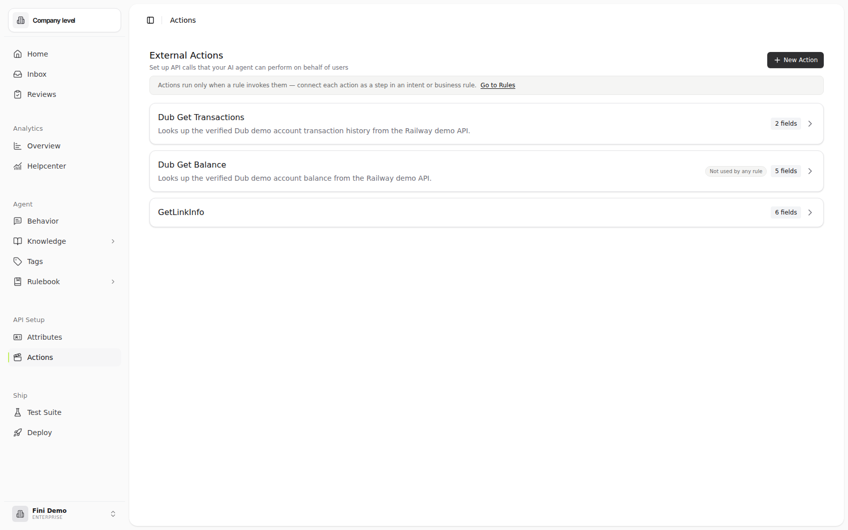 External Actions page in the Fini Demo workspace showing GetTransactions and GetBalance actions, field counts, the New Action button, and an inline notice linking to Rules