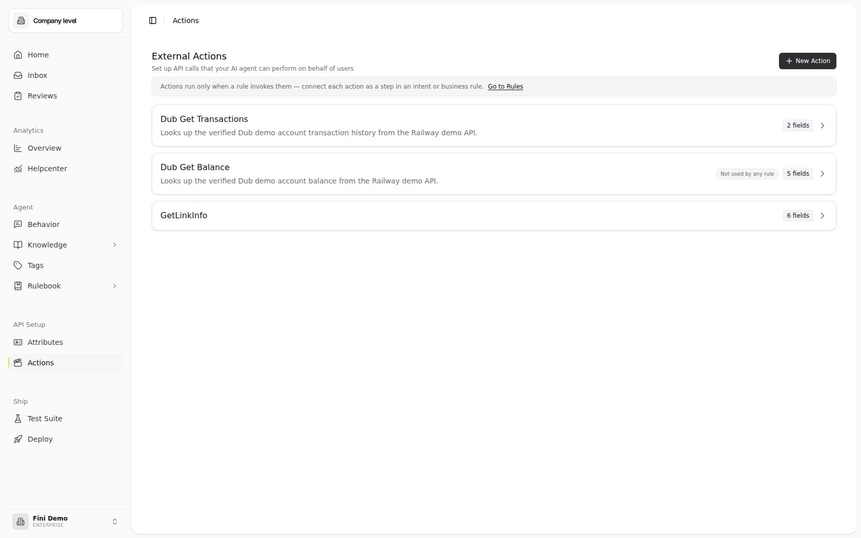 External Actions page in the Fini Demo workspace showing GetTransactions and GetBalance actions, field counts, the New Action button, and an inline notice linking to Rules