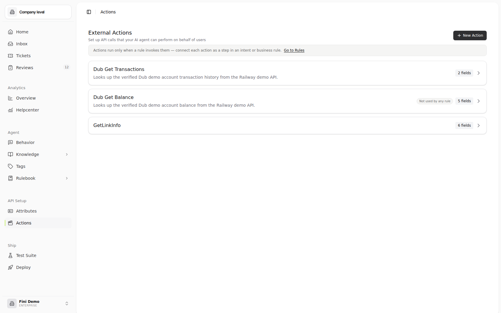 External Actions page in the Fini Demo workspace showing GetTransactions and GetBalance actions, field counts, the New Action button, and an inline notice linking to Rules